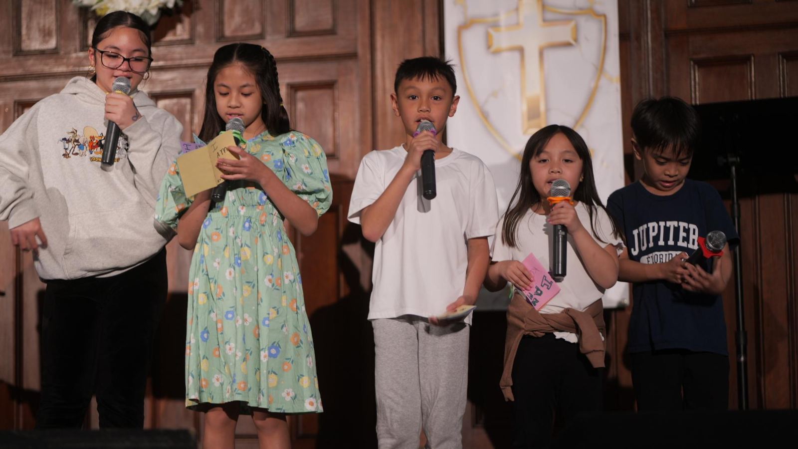 Children sharing on stage